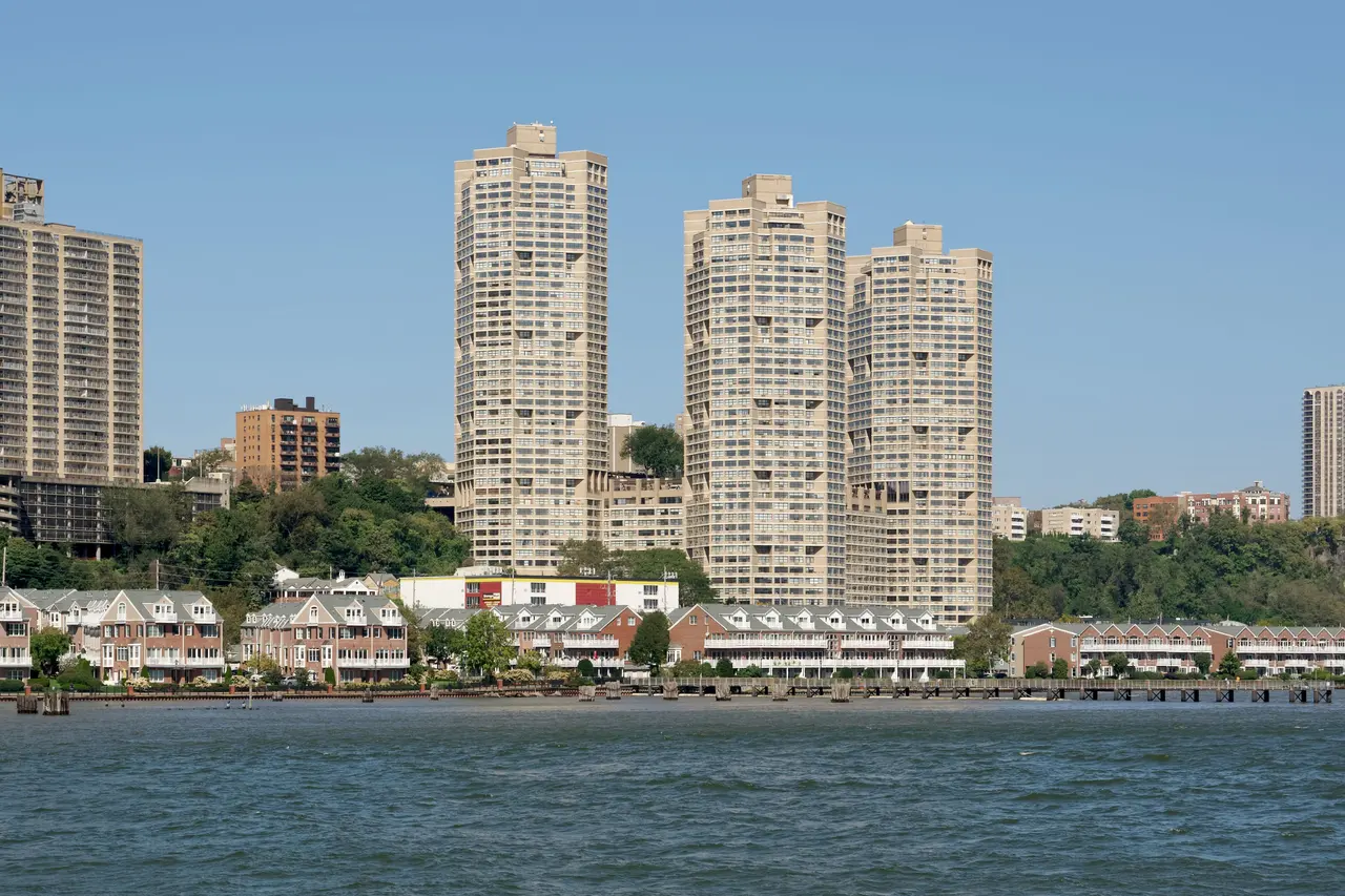 Apartment towers and riverfront townhouses in West New York, seen across the Hudson River